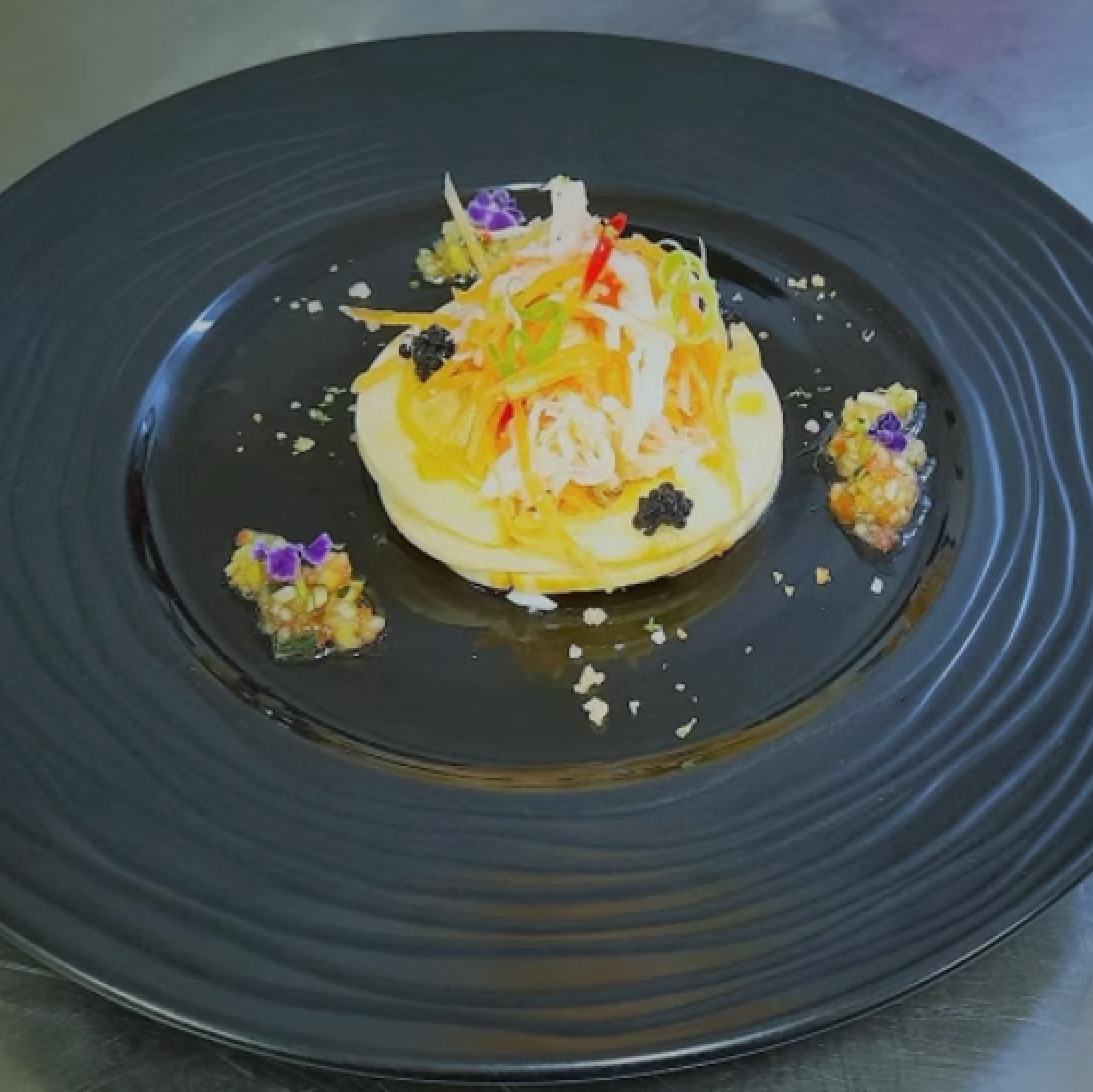 Carpaccio of saint jaques avocado citrus fruits and Bora Bora salt with vanilla.